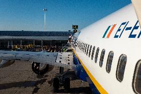 Passengers Boarding A Ryanair Aircraft Of The Low Cost Carrier