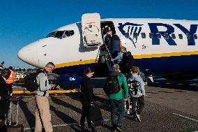 Passengers Boarding A Ryanair Aircraft Of The Low Cost Carrier