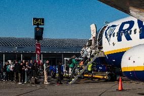 Passengers Boarding A Ryanair Aircraft Of The Low Cost Carrier