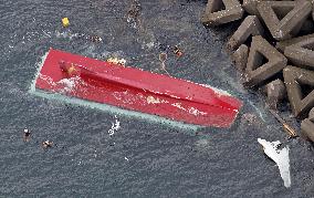 Fishing vessel capsizes off central Japan