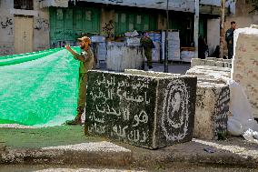 Settlers Storm The Old City Of Hebron - West Bank