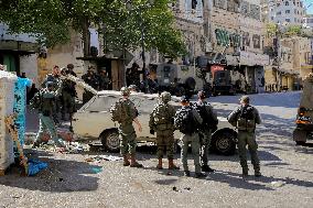 Settlers Storm The Old City Of Hebron - West Bank