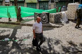 Settlers Storm The Old City Of Hebron - West Bank