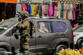 Settlers Storm The Old City Of Hebron - West Bank