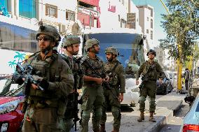 Settlers Storm The Old City Of Hebron - West Bank