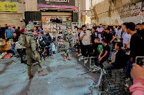 Settlers Storm The Old City Of Hebron - West Bank