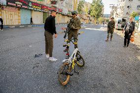 Settlers Storm The Old City Of Hebron - West Bank