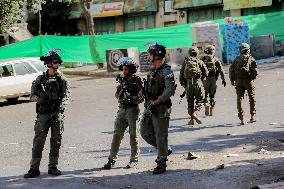 Settlers Storm The Old City Of Hebron - West Bank