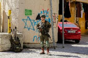 Settlers Storm The Old City Of Hebron - West Bank