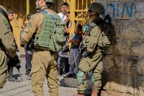 Settlers Storm The Old City Of Hebron - West Bank