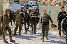 Settlers Storm The Old City Of Hebron - West Bank