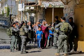 Settlers Storm The Old City Of Hebron - West Bank