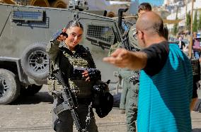 Settlers Storm The Old City Of Hebron - West Bank