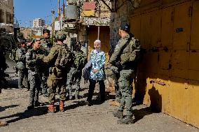 Settlers Storm The Old City Of Hebron - West Bank