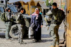 Settlers Storm The Old City Of Hebron - West Bank