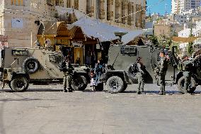 Settlers Storm The Old City Of Hebron - West Bank