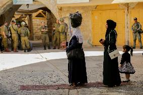 Settlers Storm The Old City Of Hebron - West Bank