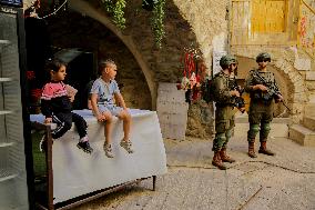 Settlers Storm The Old City Of Hebron - West Bank