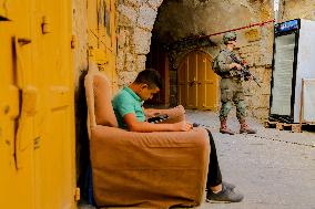 Settlers Storm The Old City Of Hebron - West Bank