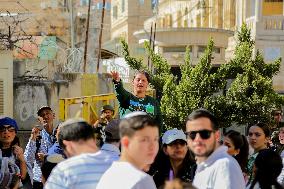 Settlers Storm The Old City Of Hebron - West Bank