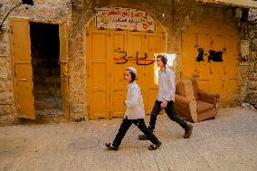 Settlers Storm The Old City Of Hebron - West Bank