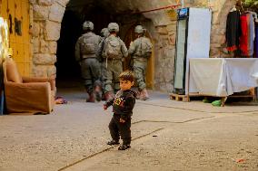 Settlers Storm The Old City Of Hebron - West Bank