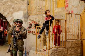 Settlers Storm The Old City Of Hebron - West Bank