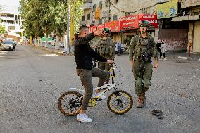 Settlers Storm the Old City of Hebron - Palestine