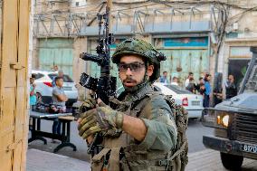 Settlers Storm the Old City of Hebron - West Bank