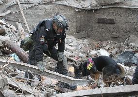 SAR dogs at work after Russian missile attack on Dnipro