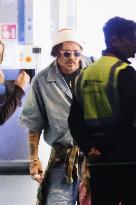 Johnny Depp Arrives At Airport - Milan