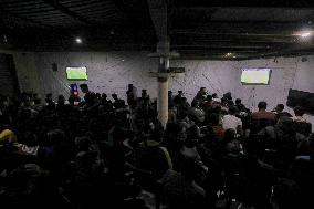 People Watch Football During Conflict In Bureij Camp - Gaza