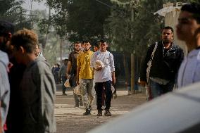 Displaced Palestinians Queue To Buy Bread - Gaza