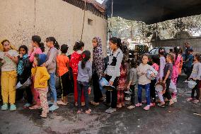 Displaced Children Waiting For Food Distribution - Gaza