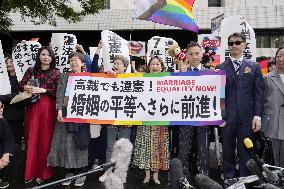 CORRECTED: Japan court rules same-sex marriage ban unconstitutional