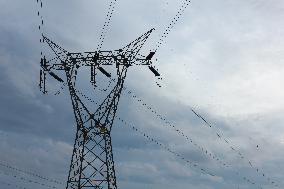 High-Voltage Transmission Tower Near Enel Power Plant In Cerano (BR)