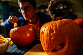 Collecting And Carving Pumpkins For Halloween Night.