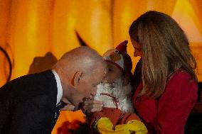 President Biden And First Lady Jill Biden, Dressed As A Panda, Give Out Books And Sweets At The Annual White House Halloween Eve