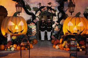 President Biden And First Lady Jill Biden, Dressed As A Panda, Give Out Books And Sweets At The Annual White House Halloween Eve