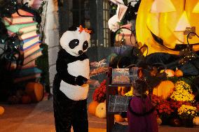 President Biden And First Lady Jill Biden, Dressed As A Panda, Give Out Books And Sweets At The Annual White House Halloween Eve