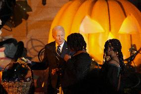 President Biden And First Lady Jill Biden, Dressed As A Panda, Give Out Books And Sweets At The Annual White House Halloween Eve