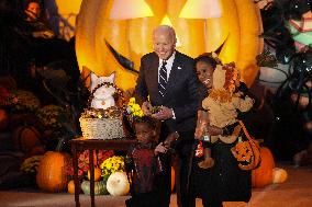 President Biden And First Lady Jill Biden, Dressed As A Panda, Give Out Books And Sweets At The Annual White House Halloween Eve