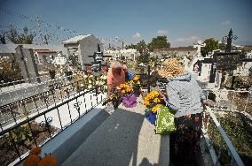 People Visit Cemeteries For The Dia De Muertos Celebrations