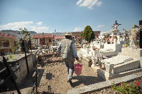 People Visit Cemeteries For The Dia De Muertos Celebrations