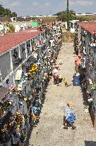 People Visit Cemeteries For The Dia De Muertos Celebrations