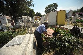 People Visit Cemeteries For The Dia De Muertos Celebrations