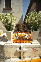 People Visit Cemeteries For The Dia De Muertos Celebrations