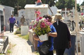 People Visit Cemeteries For The Dia De Muertos Celebrations