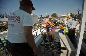 People Visit Cemeteries For The Dia De Muertos Celebrations