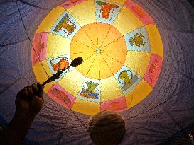 Indian People Enjoy Sight Of Hot Air Balloon Flying During Traditional Diwali Light Balloon Festival